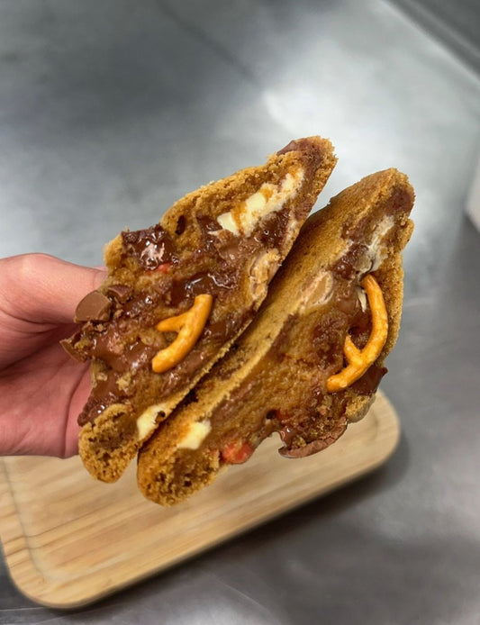 Reese’s peanut butter and Salted pretzel Stuffed Cookie - thesavvybaker
